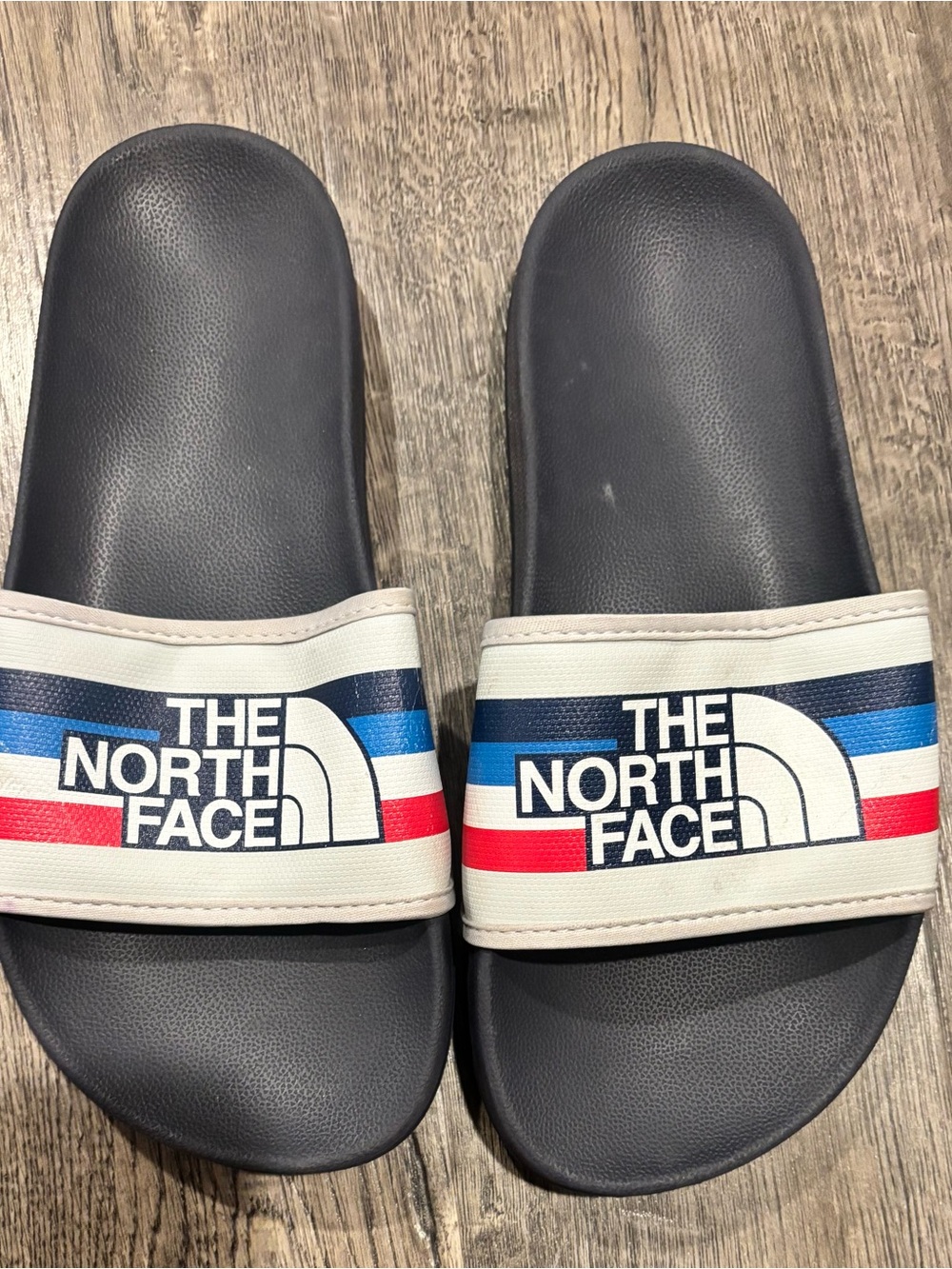 The North Face Kids Black Slide Sandals with Red & Blue Stripes